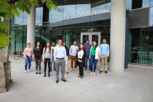 Dr. Bertassoni and team standing outside of the Knight Cancer Research Building